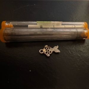 Silver pendant fish.